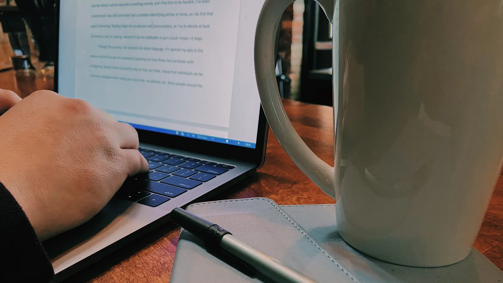 Hands of Writer Working at Laptop 