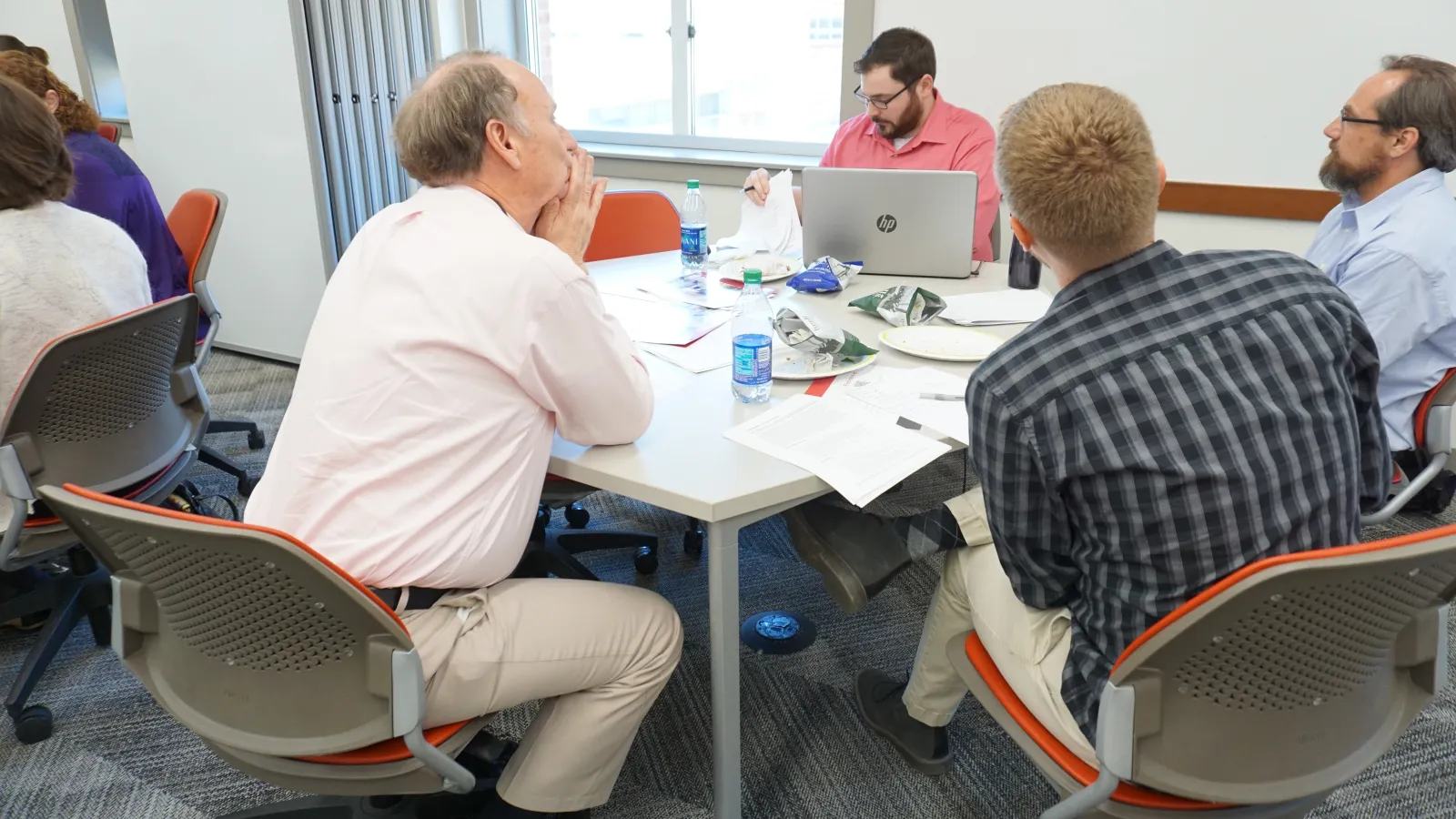 Four instructors discuss teaching information literacy at a WAC and University Libraries symposium